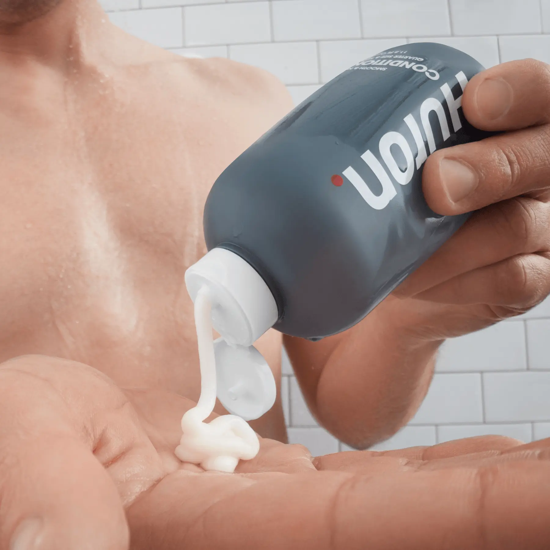 Huron conditioner being dispensed into a hand
